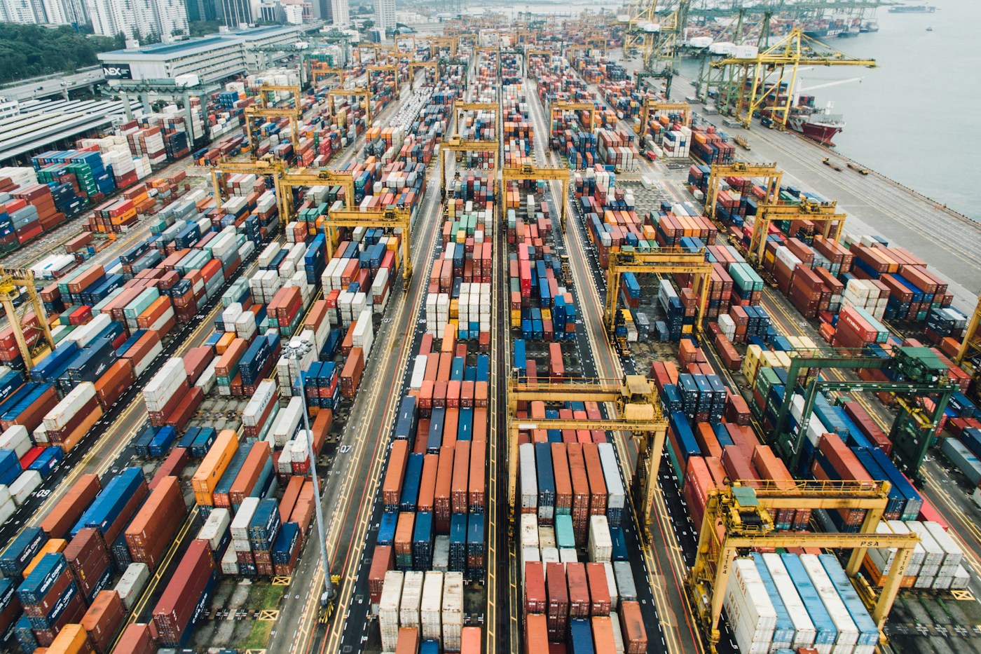 Shipping containers and cranes at a commercial port